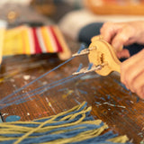 Using a fringe twister to finish hand weaving
