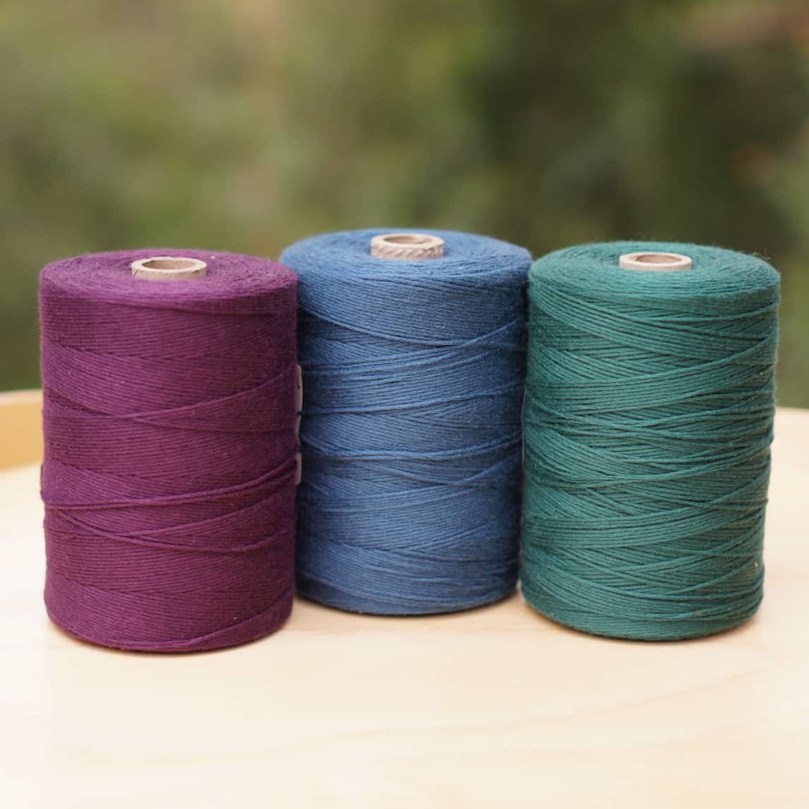 Premium Photo  A bobbin of thick thread yarn